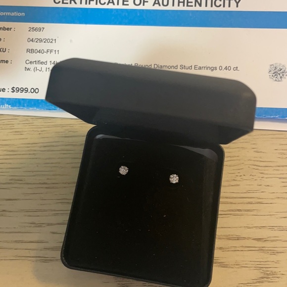 Diamond studs! I-j color in 14 k white gold. .40 cttw - Picture 1 of 4